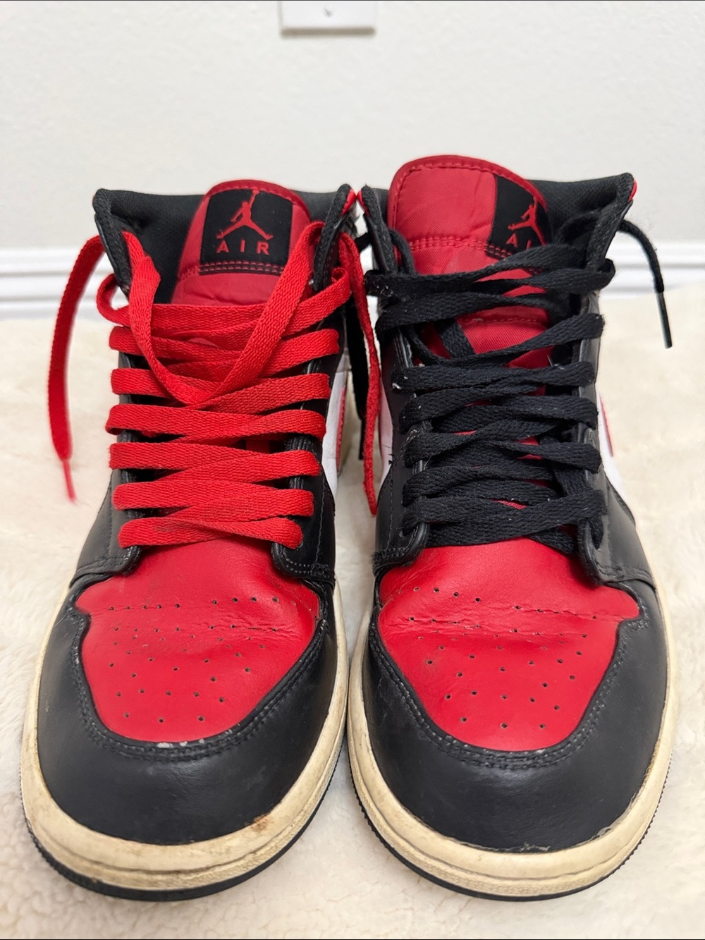 Nike Air Jordan High-Top Sneakers in Black and Red